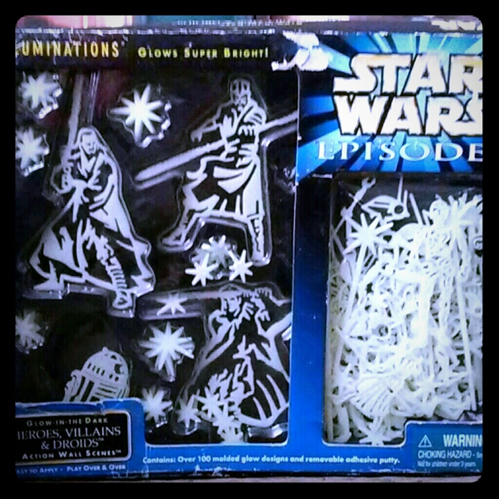 A vintage star wars glow in dark action wall scene